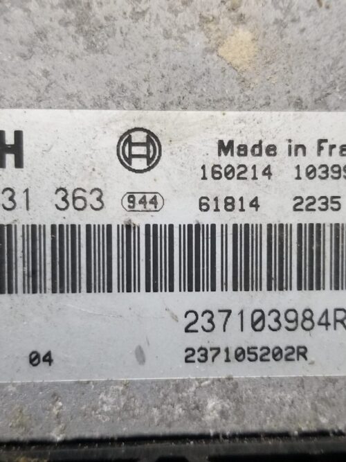 Close-up view of Bosch ECU 237103984R and associated electronic control units.