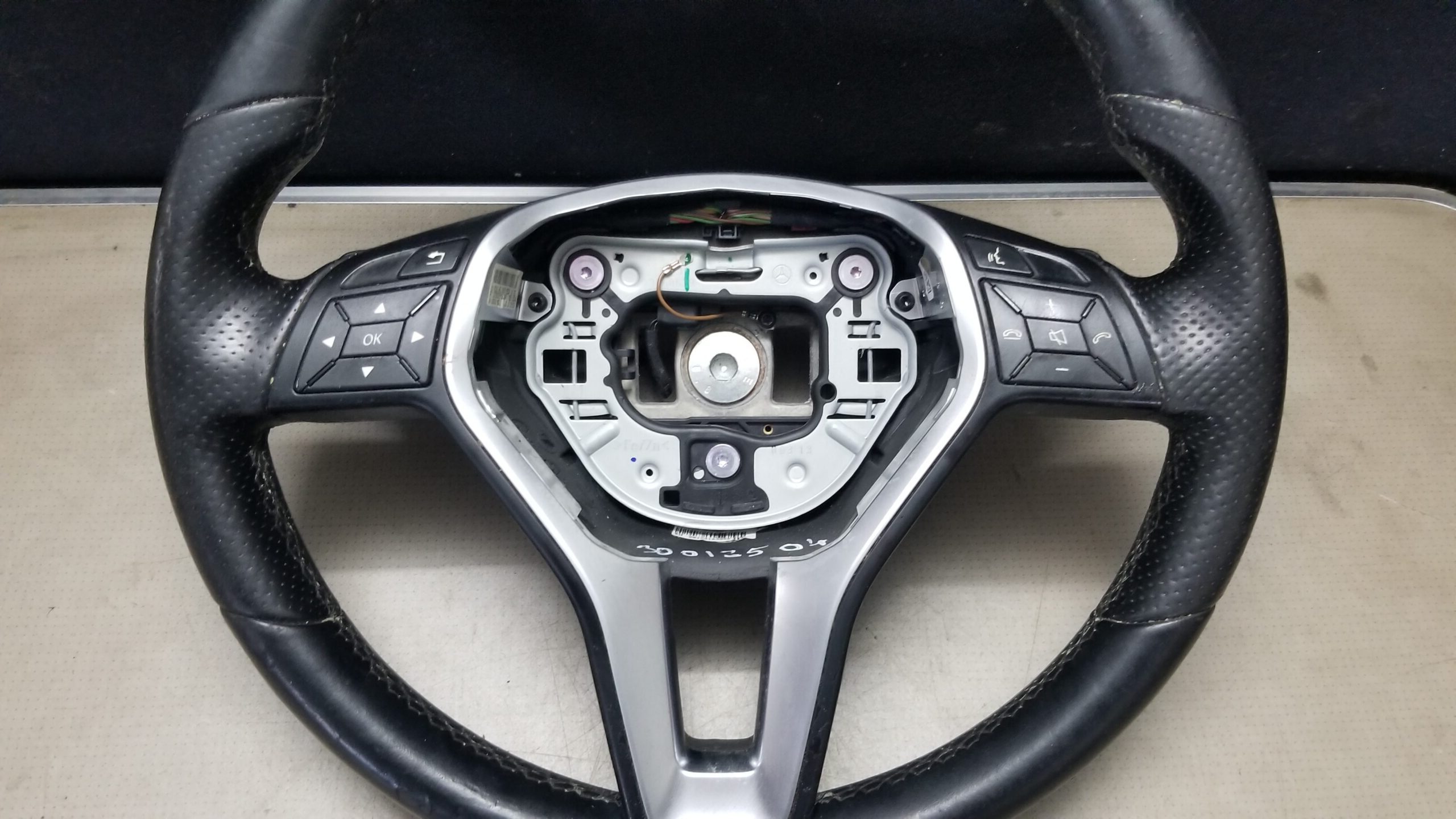 Close-up of Mercedes E Class Steering Wheel A21846006189E38 (09-16)