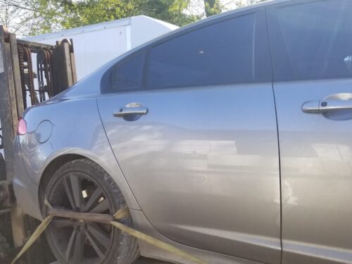 Exterior of OEM rear right passenger door for Jaguar XF 2013 in grey