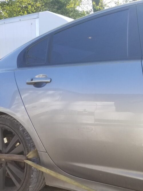 Exterior of OEM rear right passenger door for Jaguar XF 2013 in grey