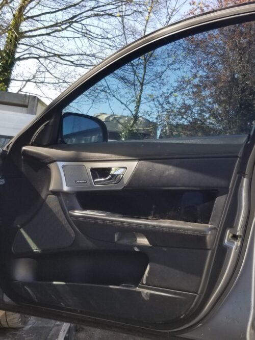 Interior view of driver side door for 2013 Jaguar XF