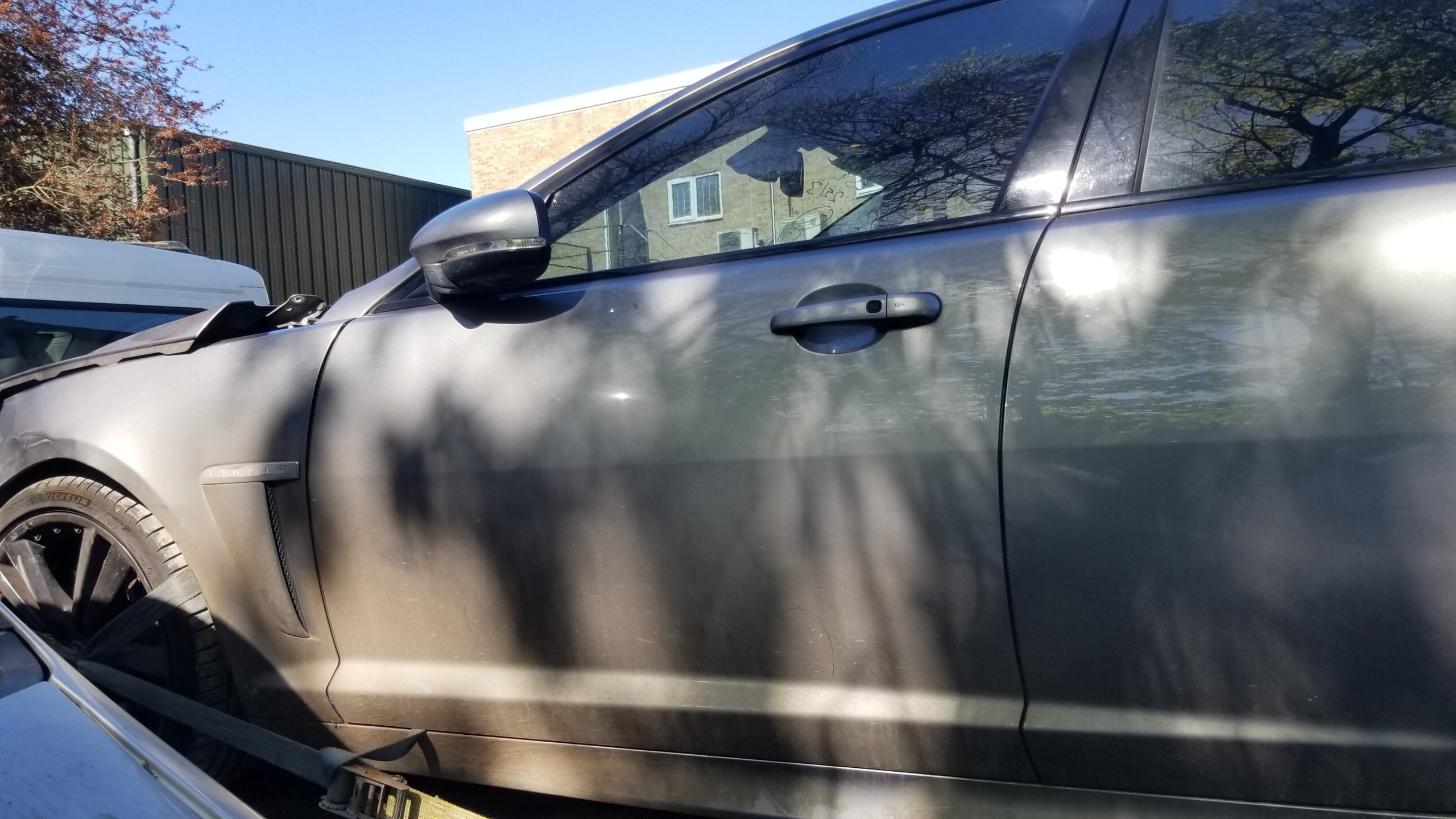 Exterior view of grey front left passenger door from 2013 Jaguar XF S Premium Luxury