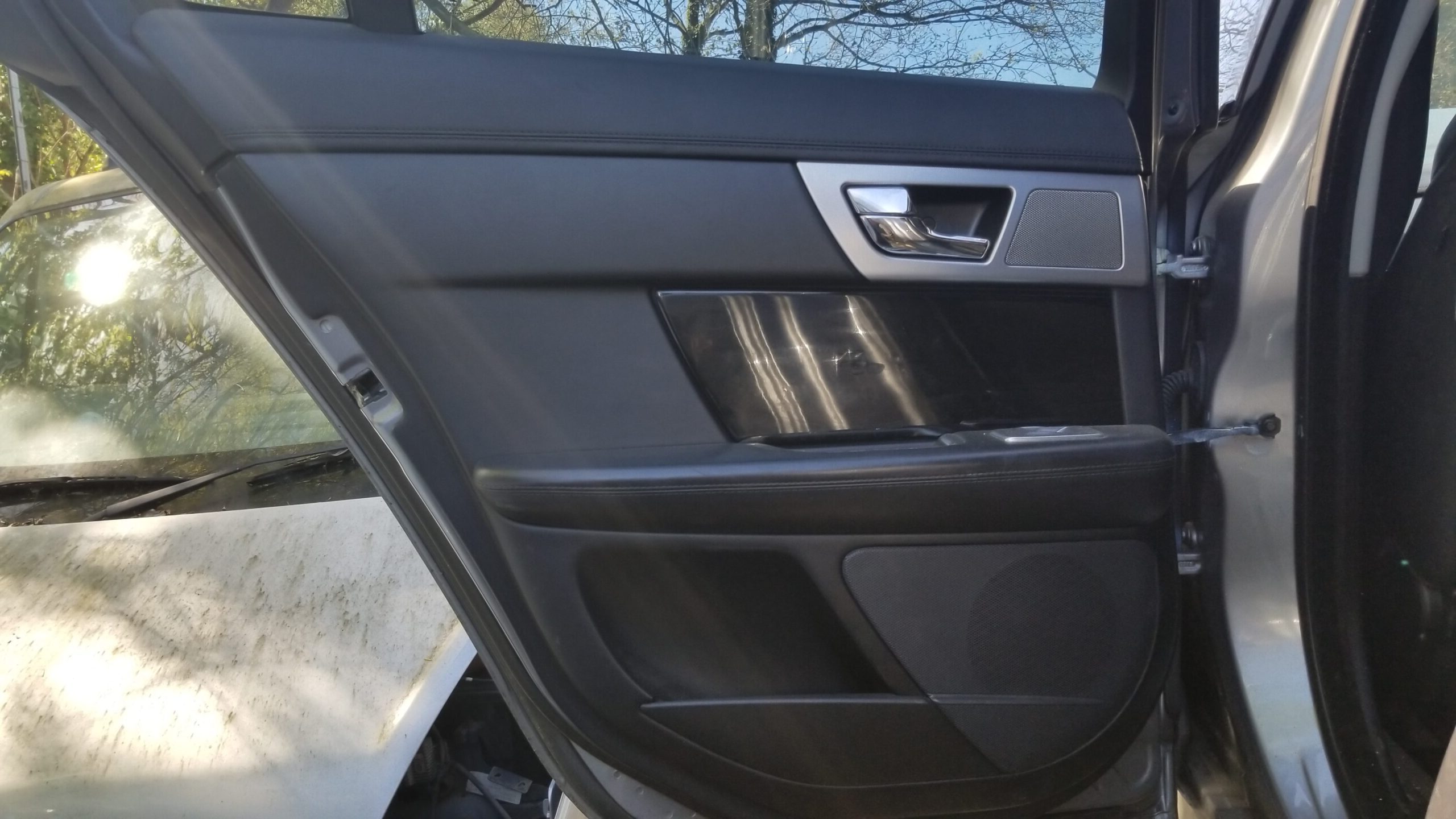 Interior panel and components of Jaguar XF 2013 rear left door, grey finish