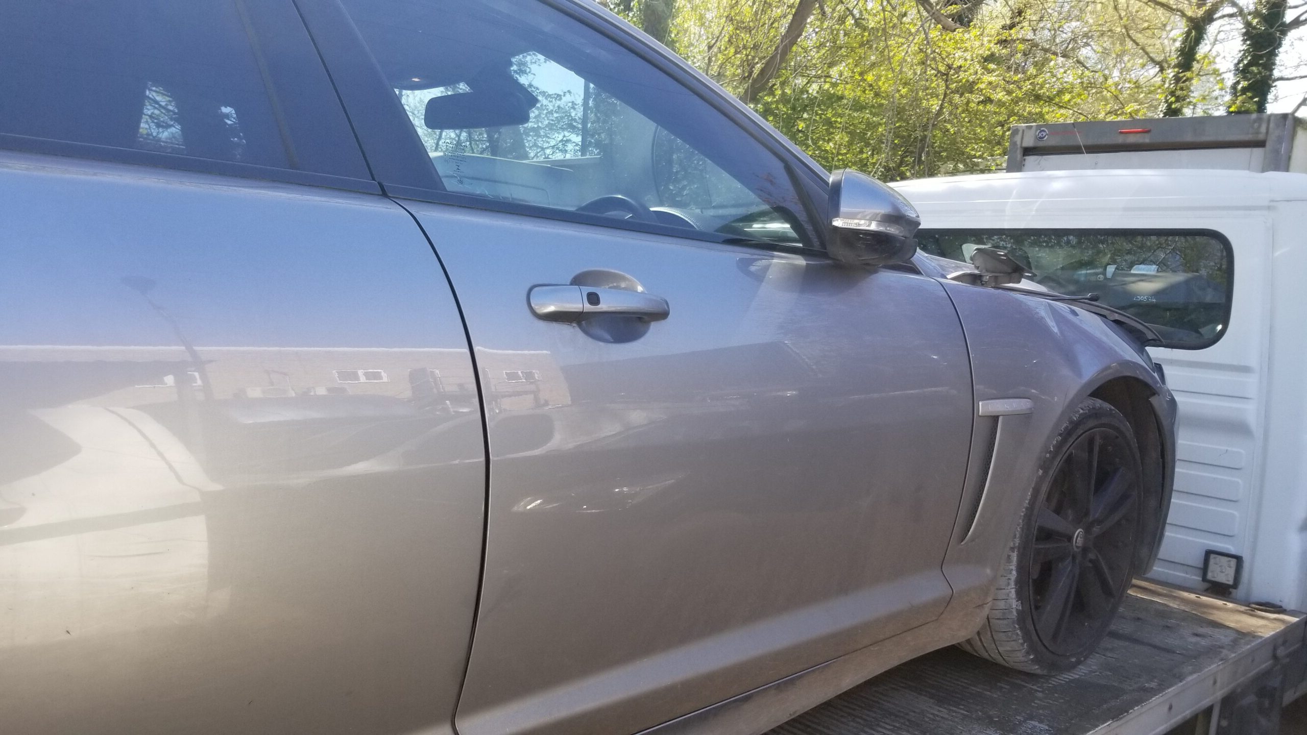 Paint and rear view of front right door for Jaguar XF 2013