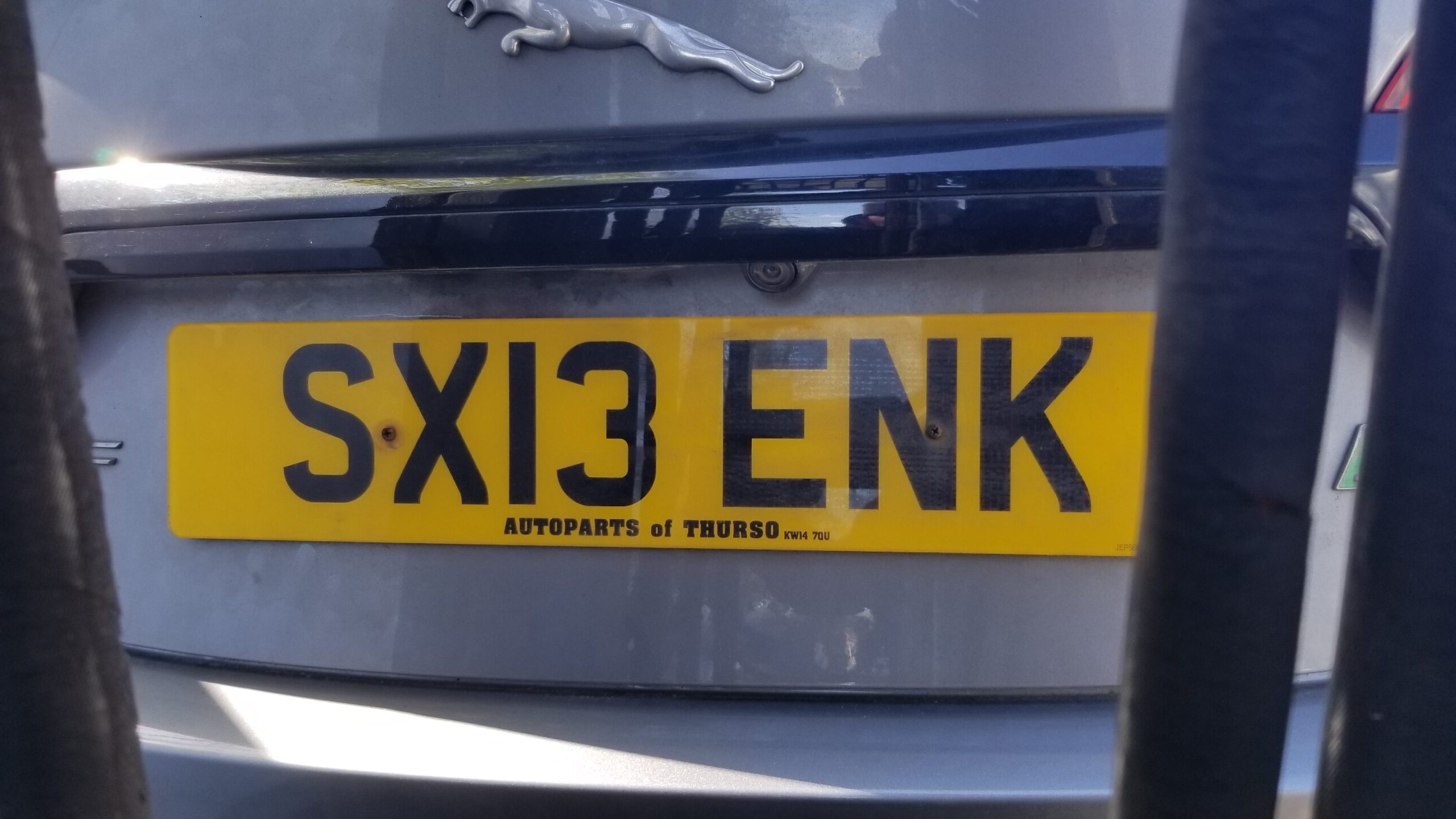 Rear view of Jaguar XF with registration plate SX13 ENK from Autoparts of Thurso