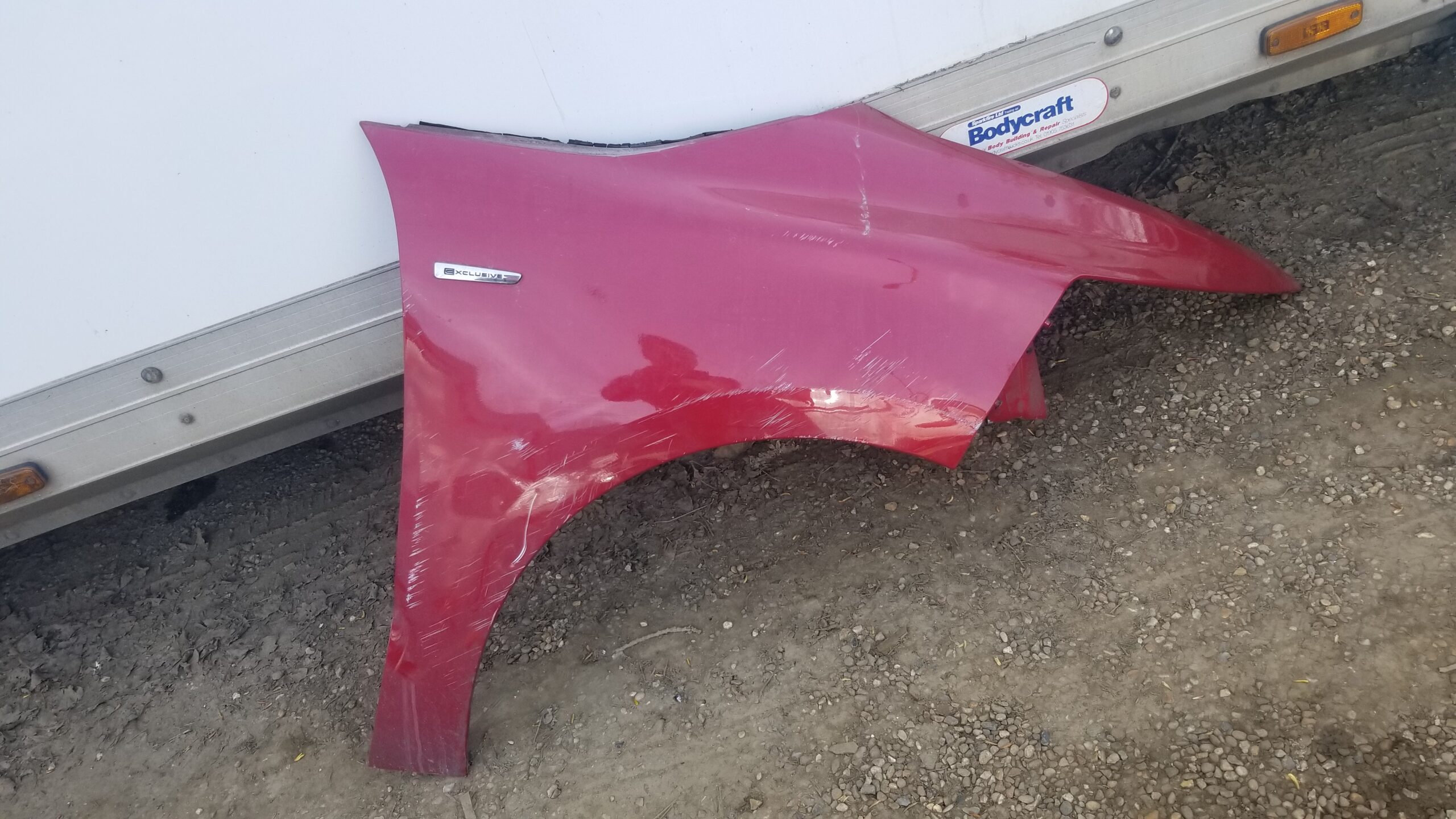 Front view of Citroën C4 Grand Picasso Mk2 RH front wing in red (2012–2018)