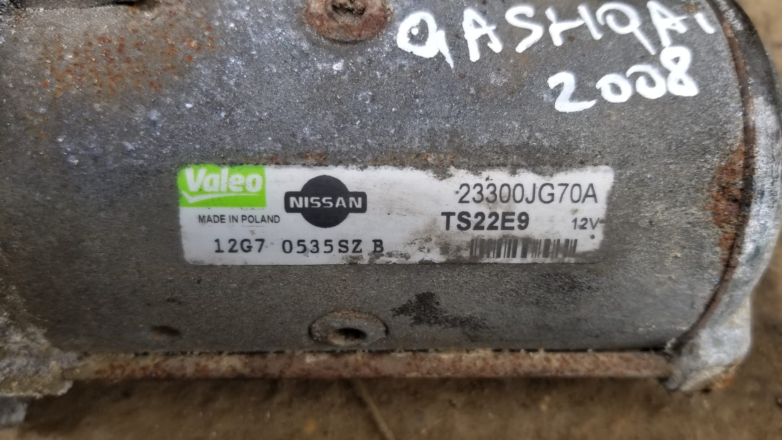 Colse up of the part number tag on starter motor 23300JG70A