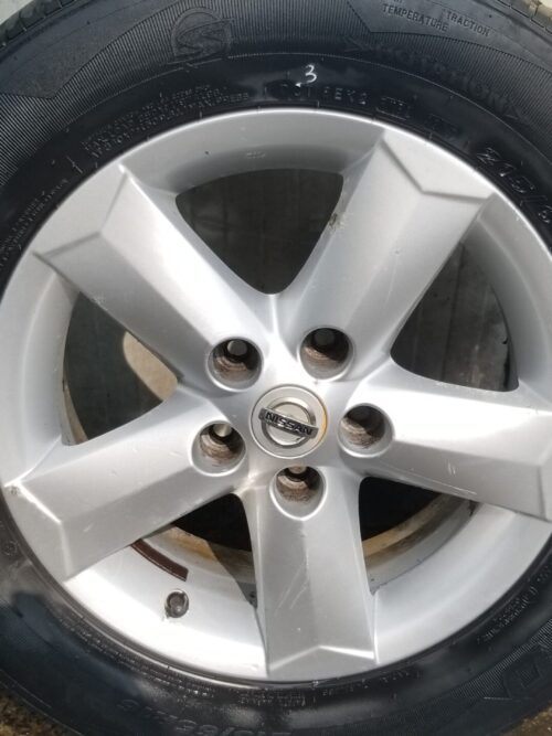 view of Qashqai alloy wheel showing tread detail