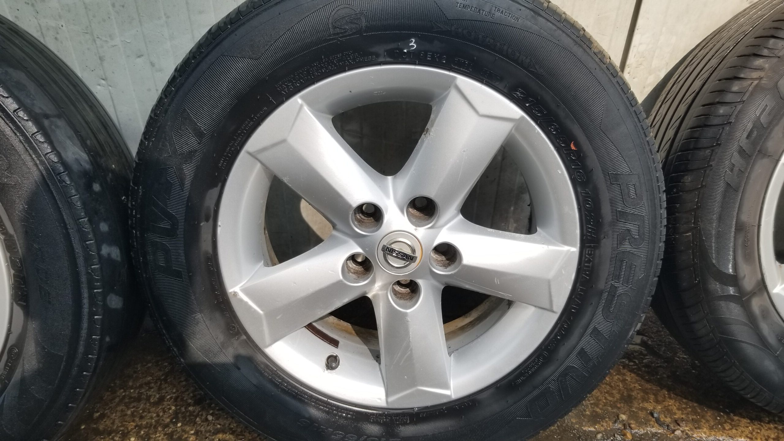 view of Qashqai alloy wheel showing tread detail