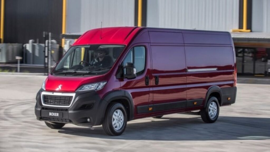 Peugeot Boxer courier van outside warehouse, ideal for fleet servicing and repairs at Vaz Auto Garage