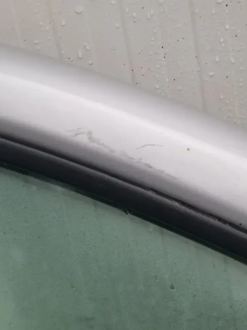 Renault Trafic Vivaro offside front door silver — window frame detail