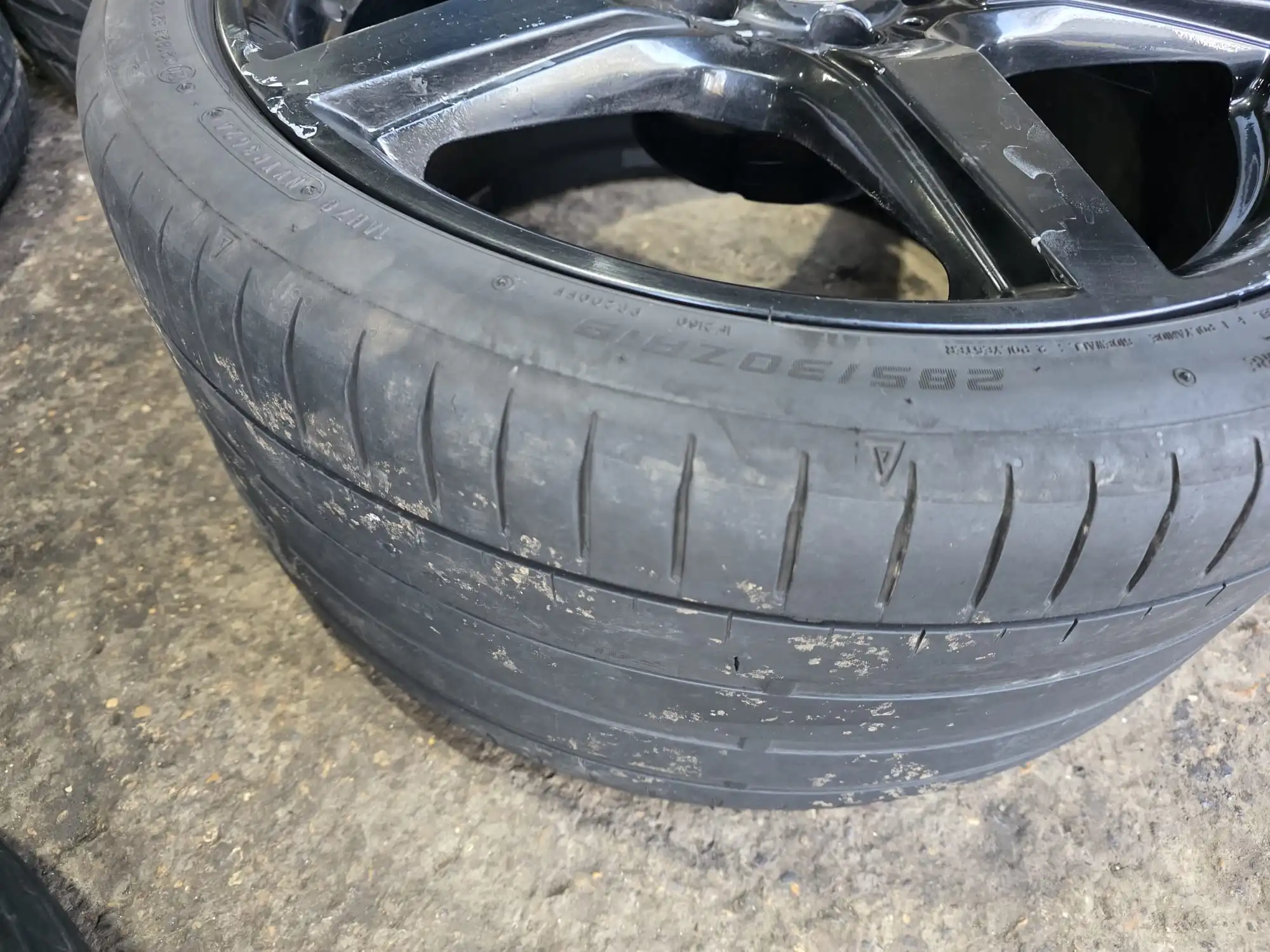 Side angle view of Mercedes CLS W218 AMG alloy wheels with tyres