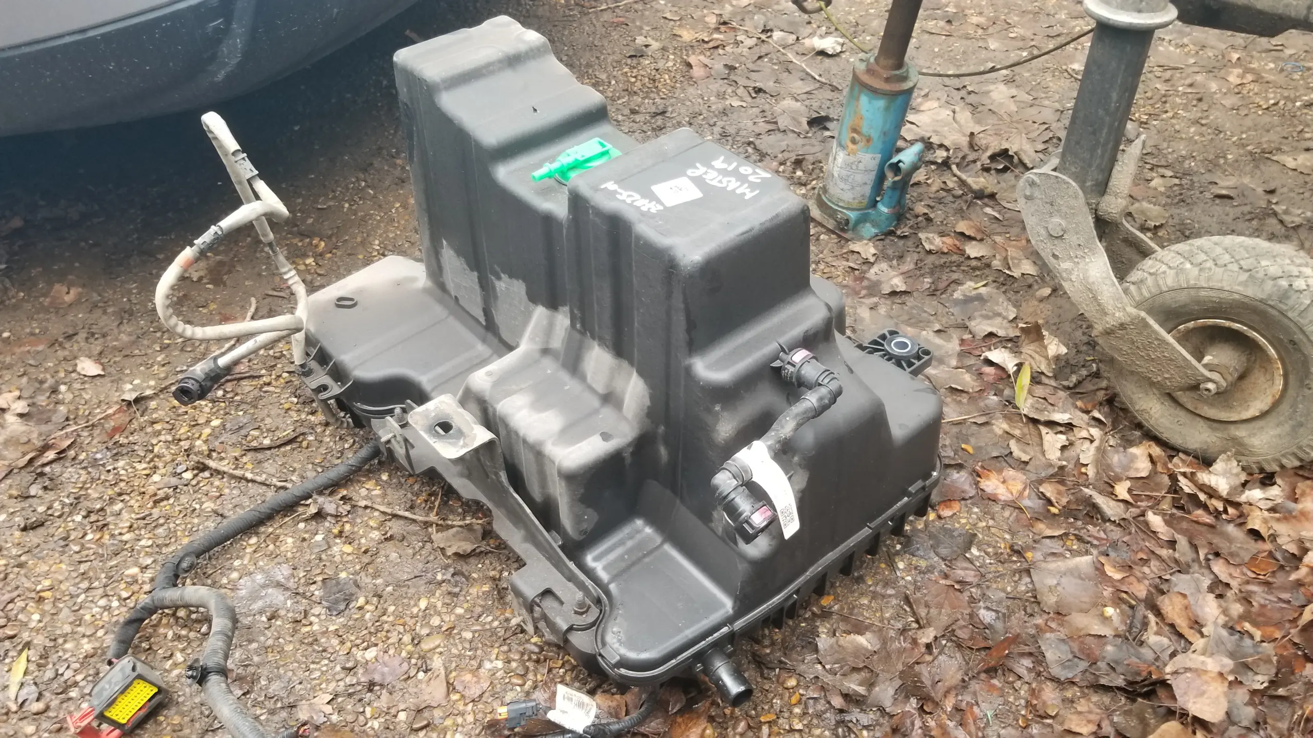 Side profile view of the Adblue Tank showing mounting brackets and shape