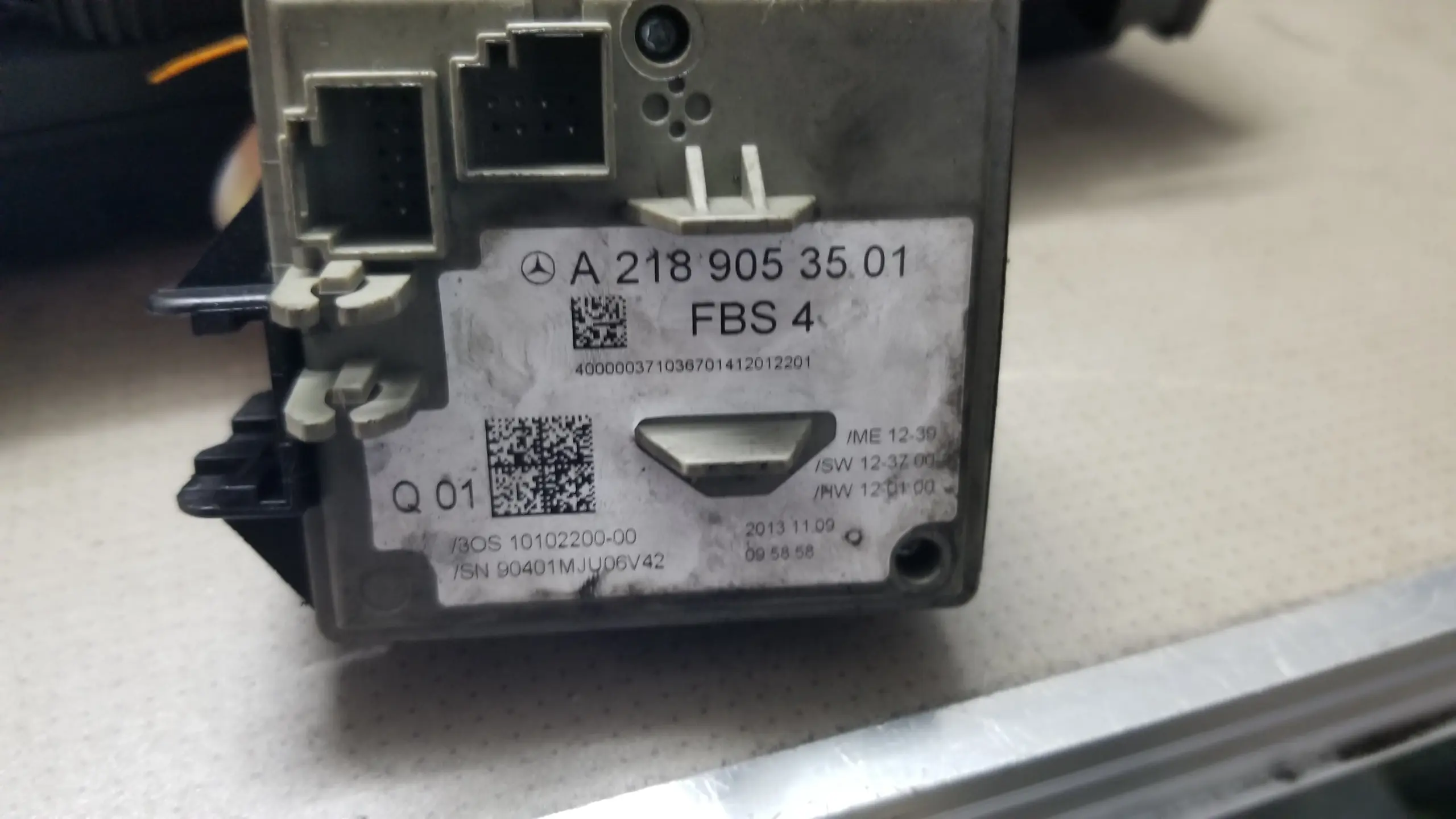 W212 E-Class hybrid inverter A6519008702 — OEM label close-up