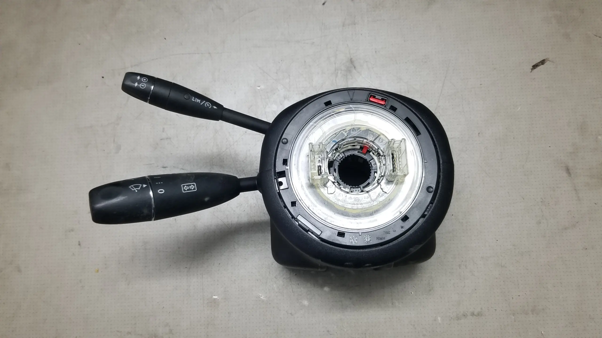 Side view of Mercedes A2129007502 switch stalk assembly