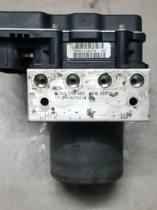 Mercedes ABS hydraulic block with brake line ports and markings