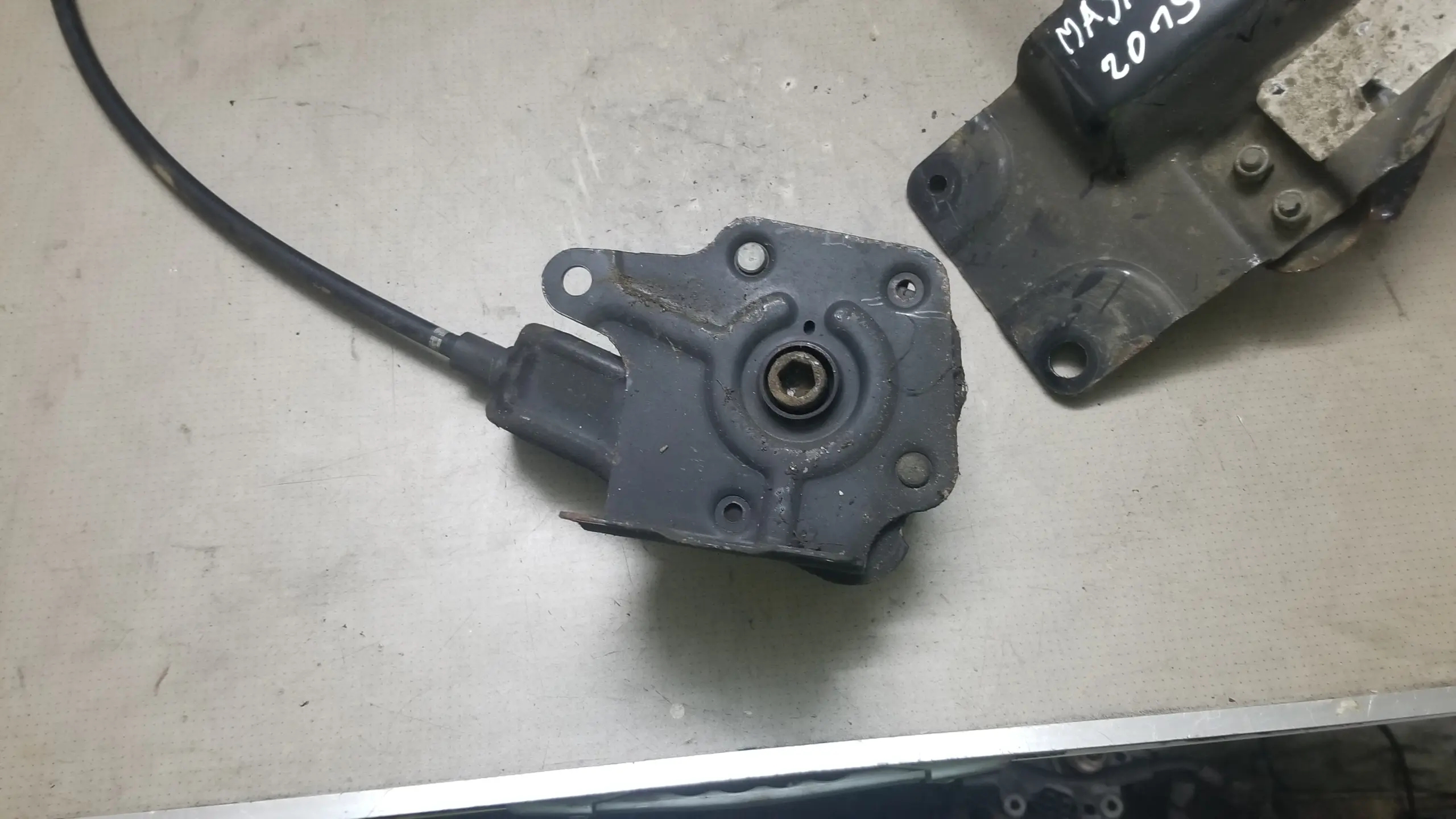 Close-up of Renault Master spare wheel winch mechanism and cable connection