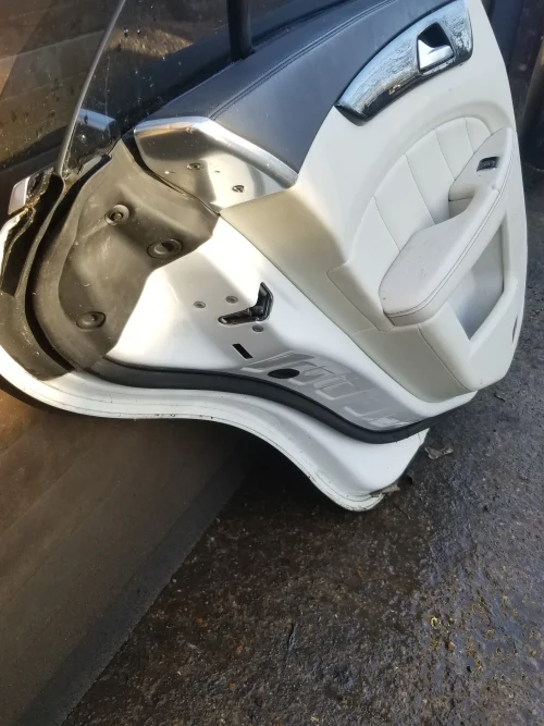 Mercedes CLS W218 rear left door side profile showing seals and frame