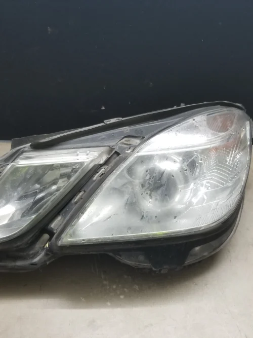 Mercedes W212 left headlight 2011 halogen A2128208361 front view