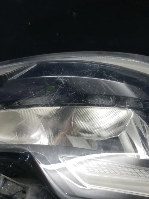 Close up Renault Master LED DRL headlight lens scratches