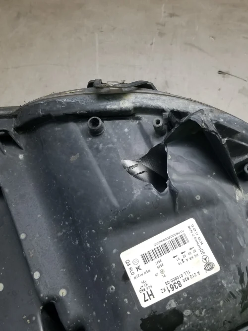 Mercedes W212 left headlight rear housing damage