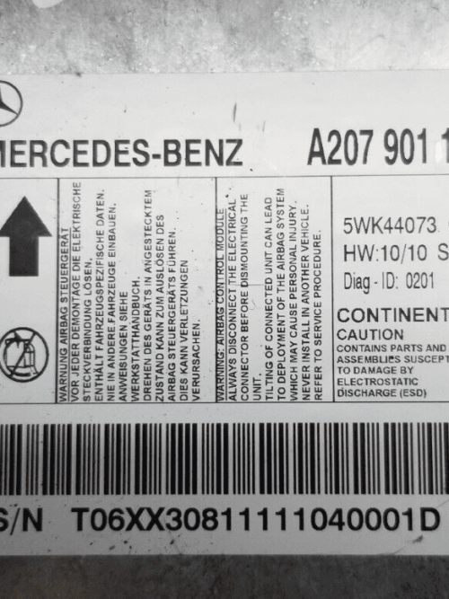 Label showing part number A2079011900 on ECU