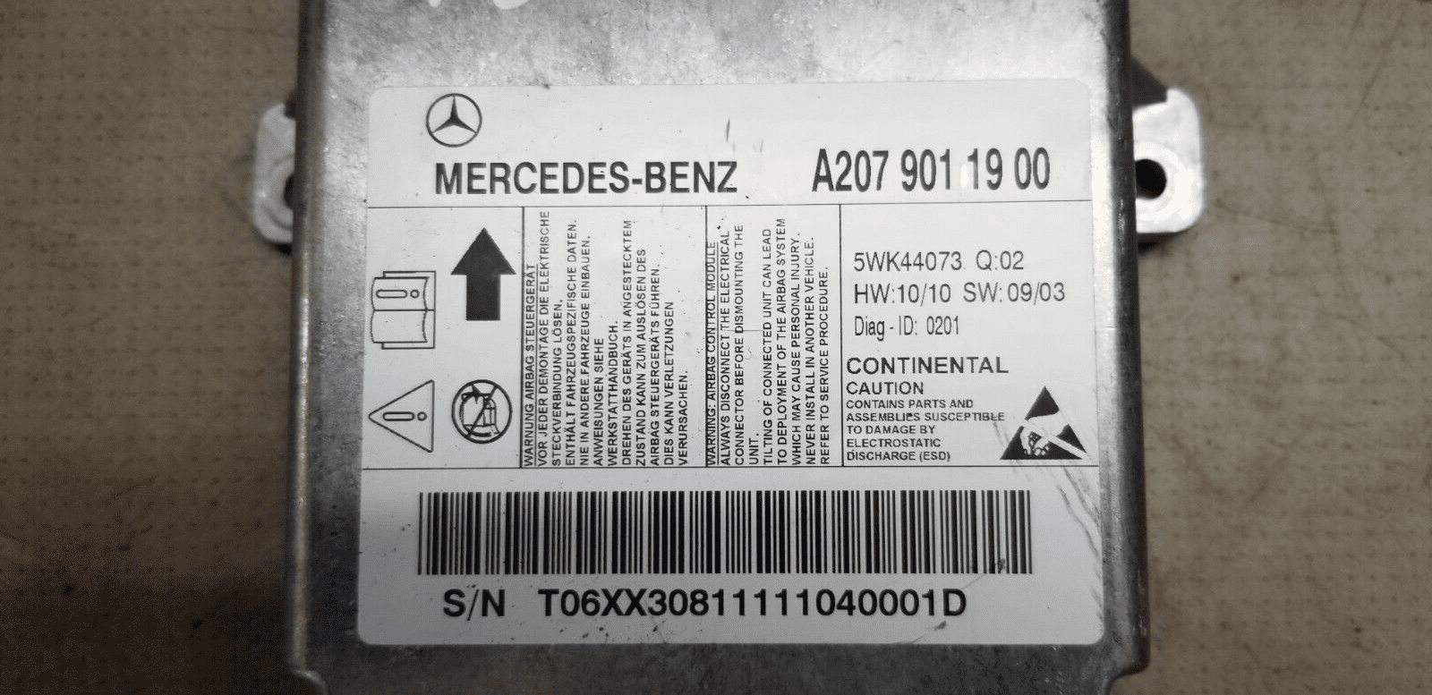 Label showing part number A2079011900 on ECU