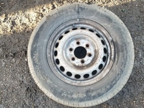 Front view of Mercedes Sprinter 16-inch steel wheel with 235/65 R16C tyre (A0014014802)