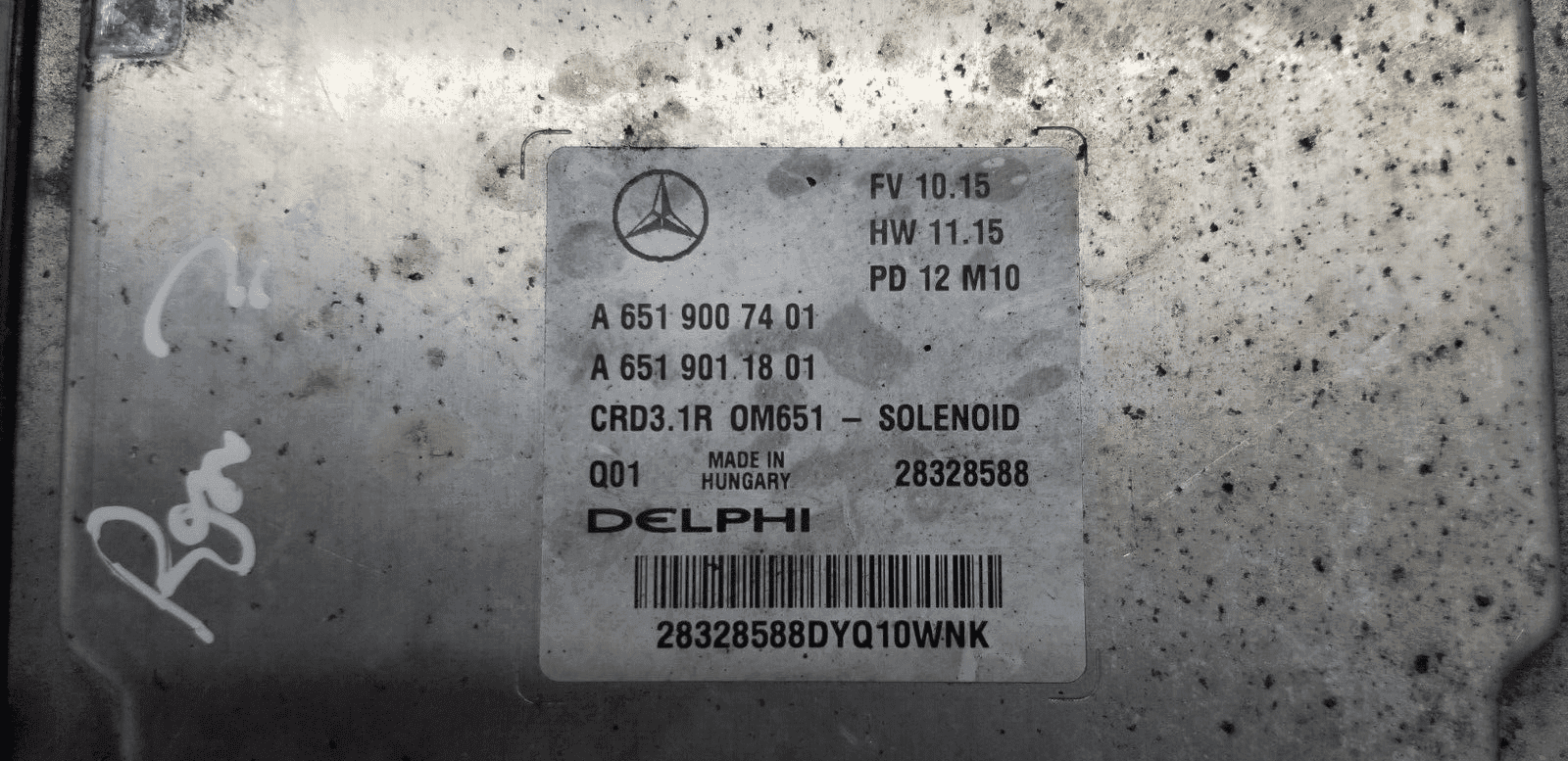 Label showing part number A6519007401 on ECU module