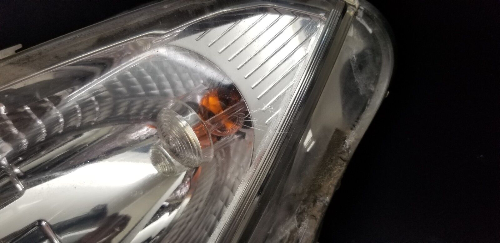 Close-up of Mercedes E-Class passenger side headlamp A2078204961