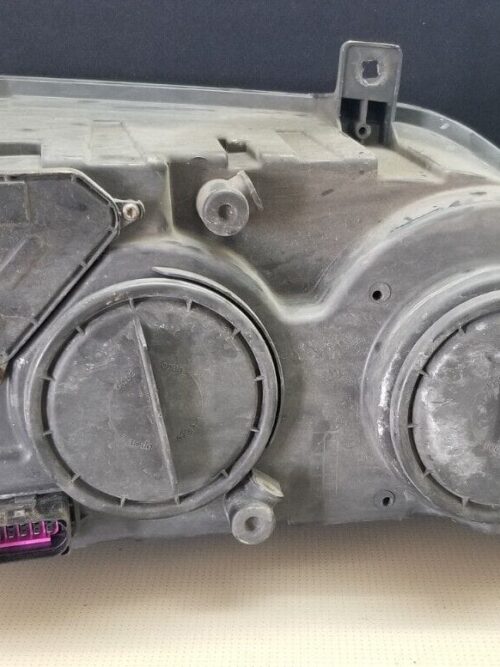 Rear view of VW Crafter right headlight assembly – used condition