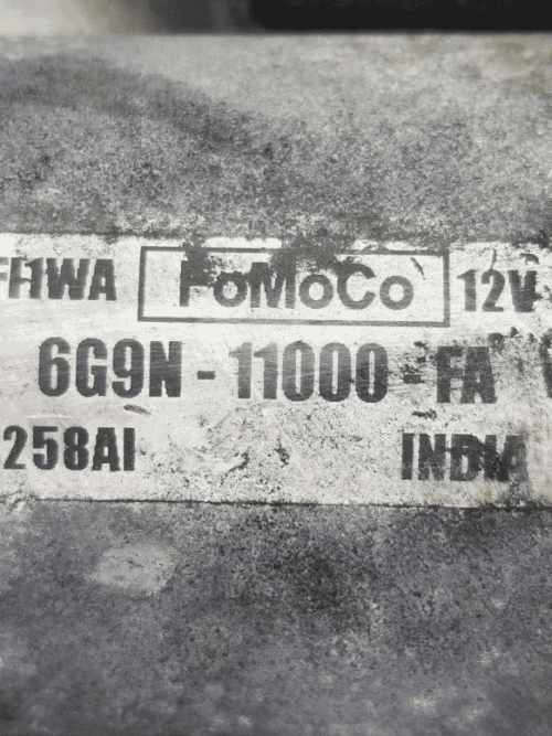 Close-up image of Ford Galaxy diesel starter motor with label visible