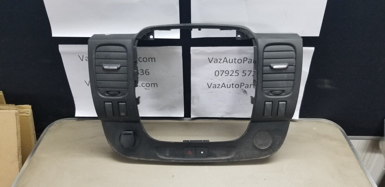 VAUXHALL VIVARO RADIO FRAME SURROUND PANEL 93452450