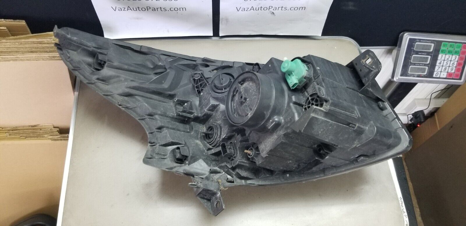 Rear view of Vauxhall Vivaro 2015 left headlight