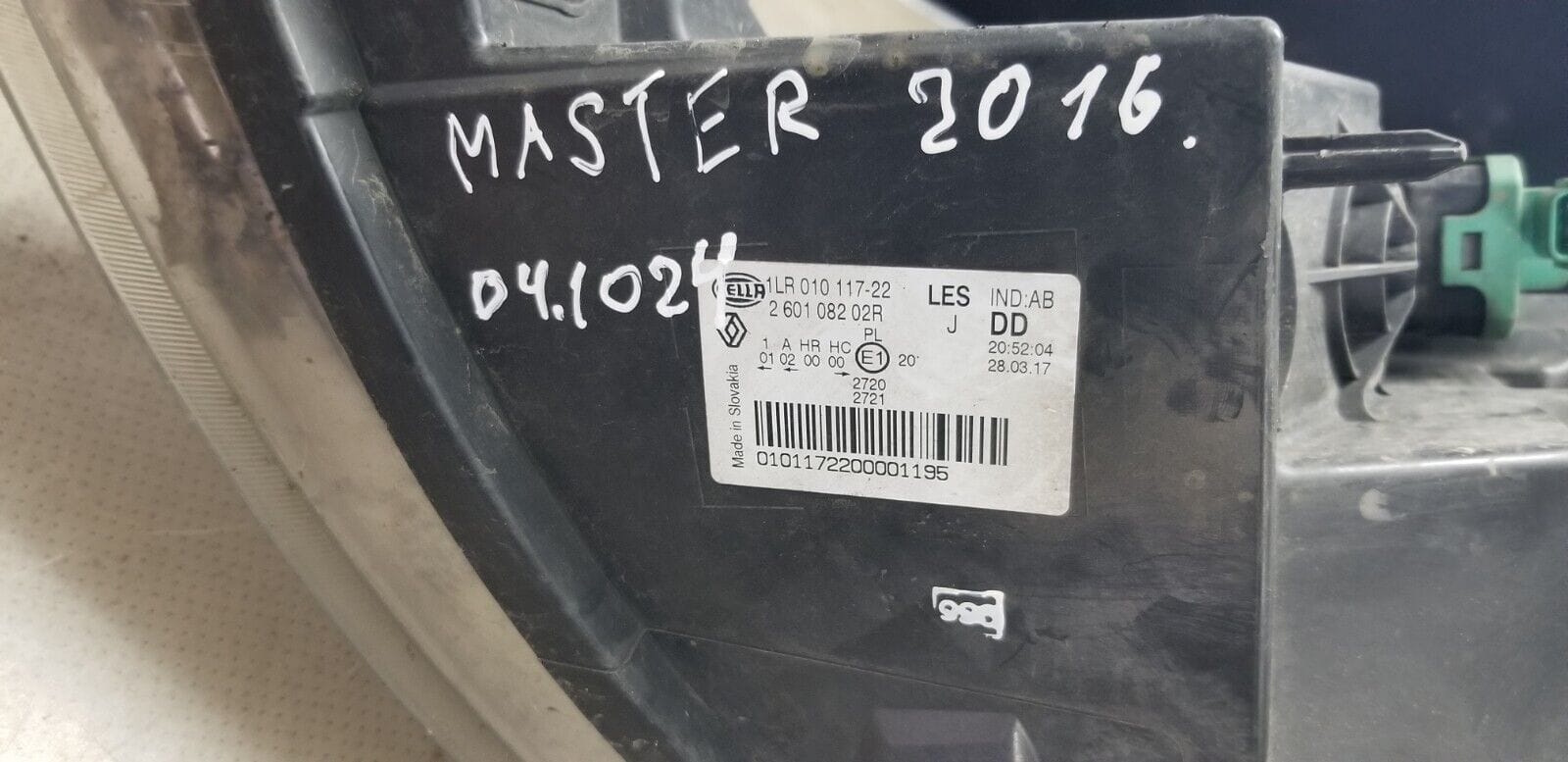 Label and part number close-up on Vauxhall Movano 2016 RH headlight