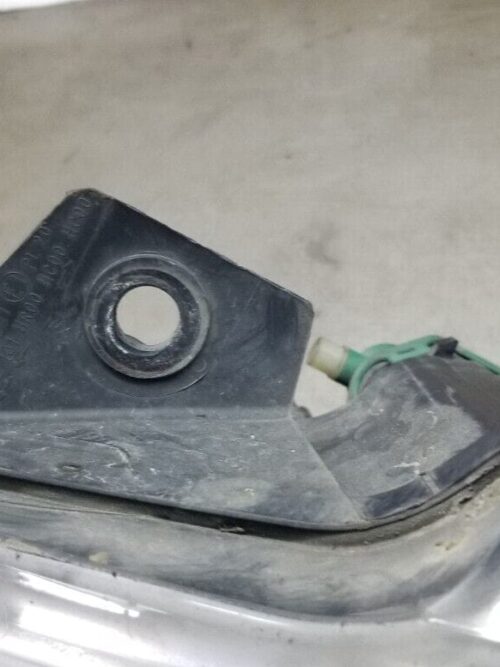 Rear view showing mounting points of right headlight