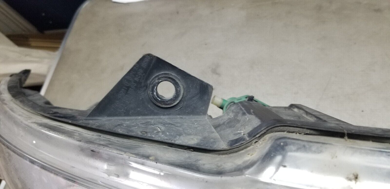 Rear view showing mounting points of right headlight