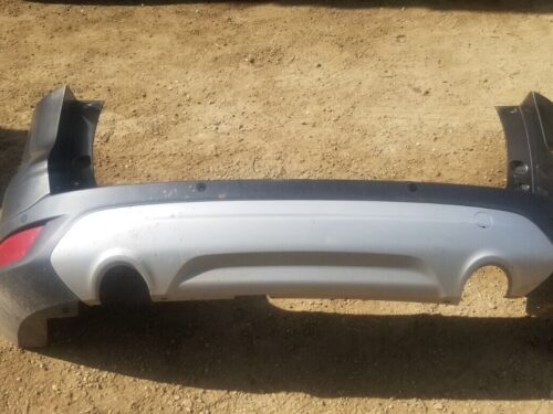 Condition close-up of used Ford Kuga 2016 Magnetic Grey rear bumper