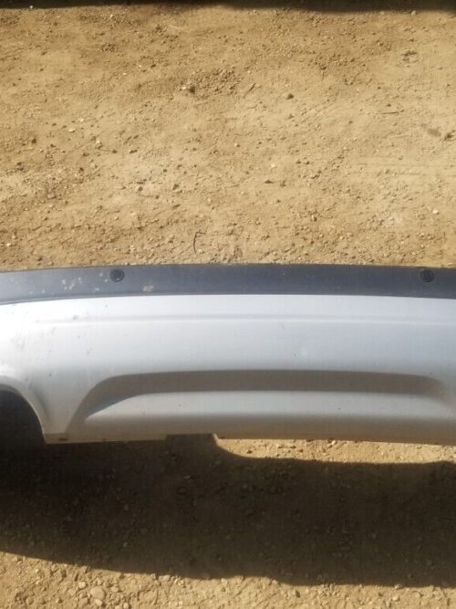 Condition close-up of used Ford Kuga 2016 Magnetic Grey rear bumper