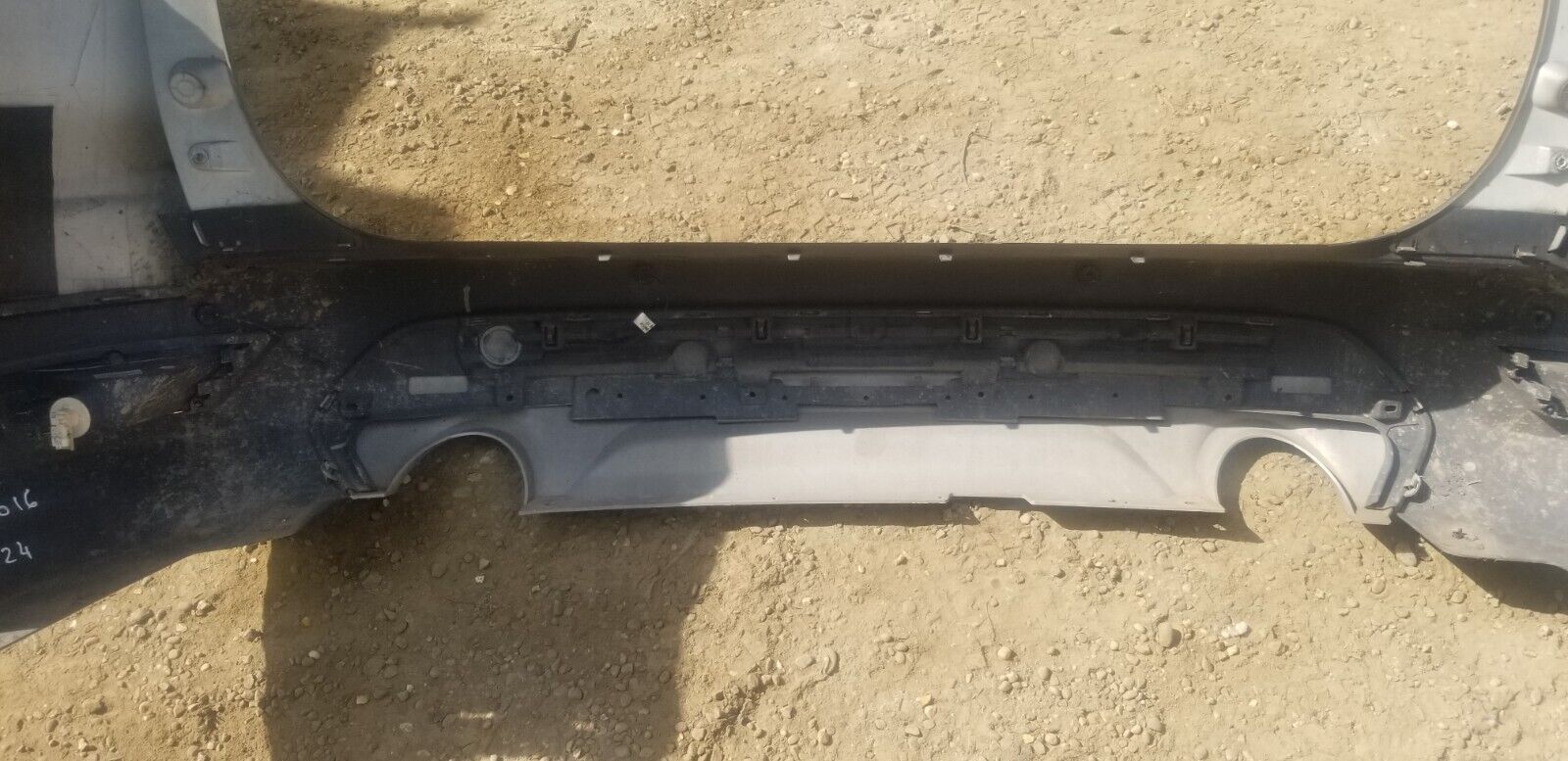 Mounting brackets and clips on Ford Kuga rear bumper Magnetic Grey 2016