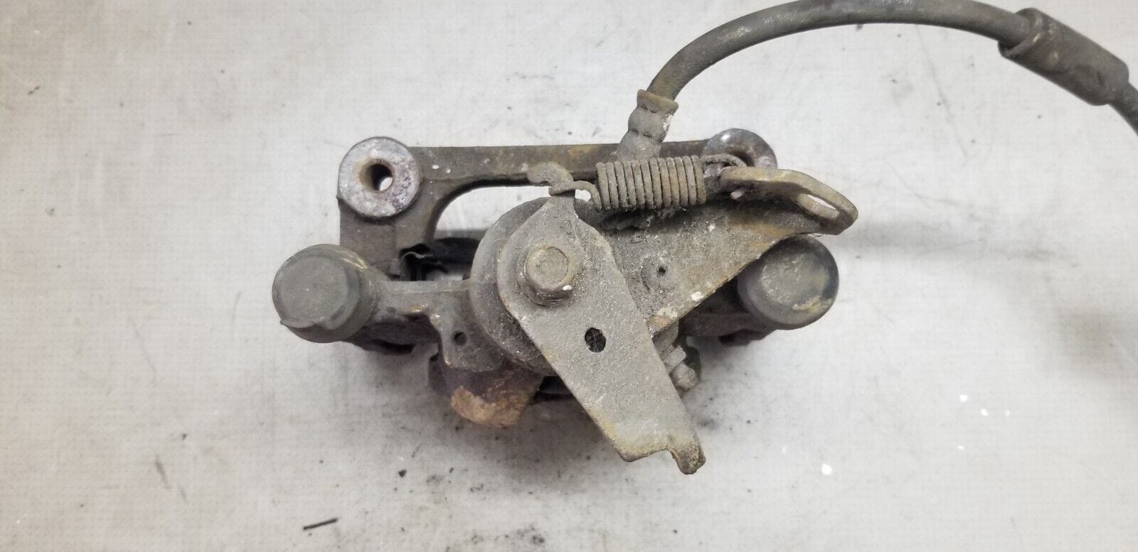 Close-up view of piston on Renault Master rear brake caliper OEM