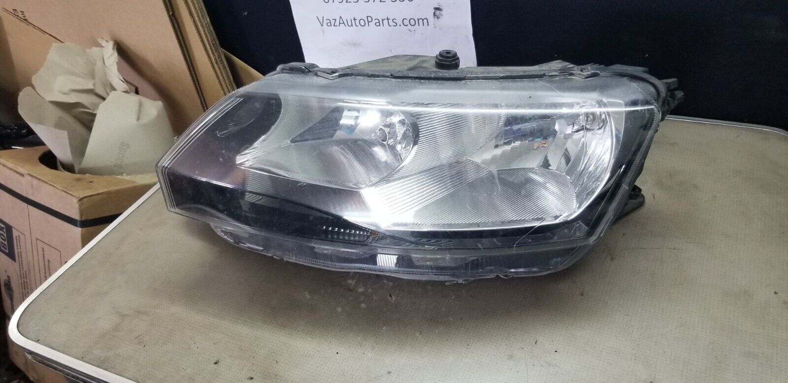 Front view of OEM headlight 5JC941015 for Skoda Rapid 2016