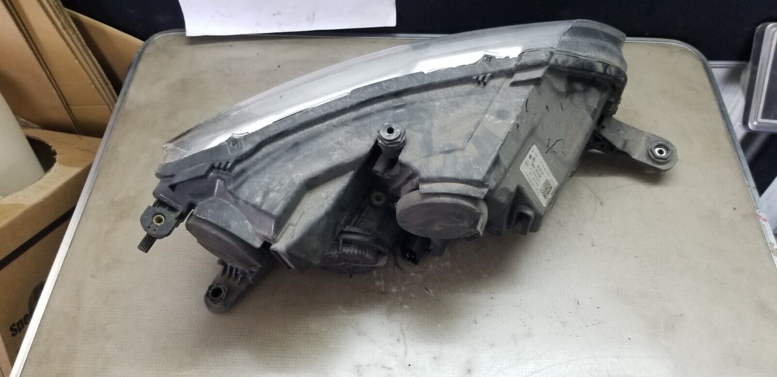 Side view of Skoda Rapid 2016 passenger side headlight unit