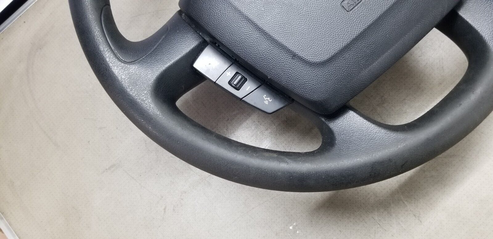 Close-up of Peugeot Boxer steering wheel radio controls