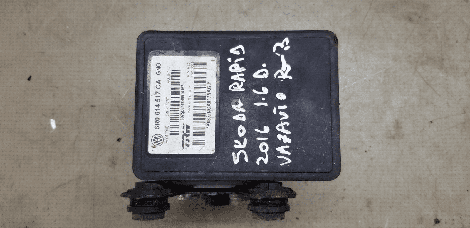 Top view of Skoda Rapid ABS module 6R0 614 517 CA