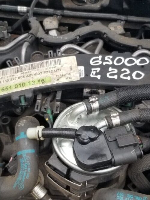 Top view showcasing components of Mercedes E220 SE Engine