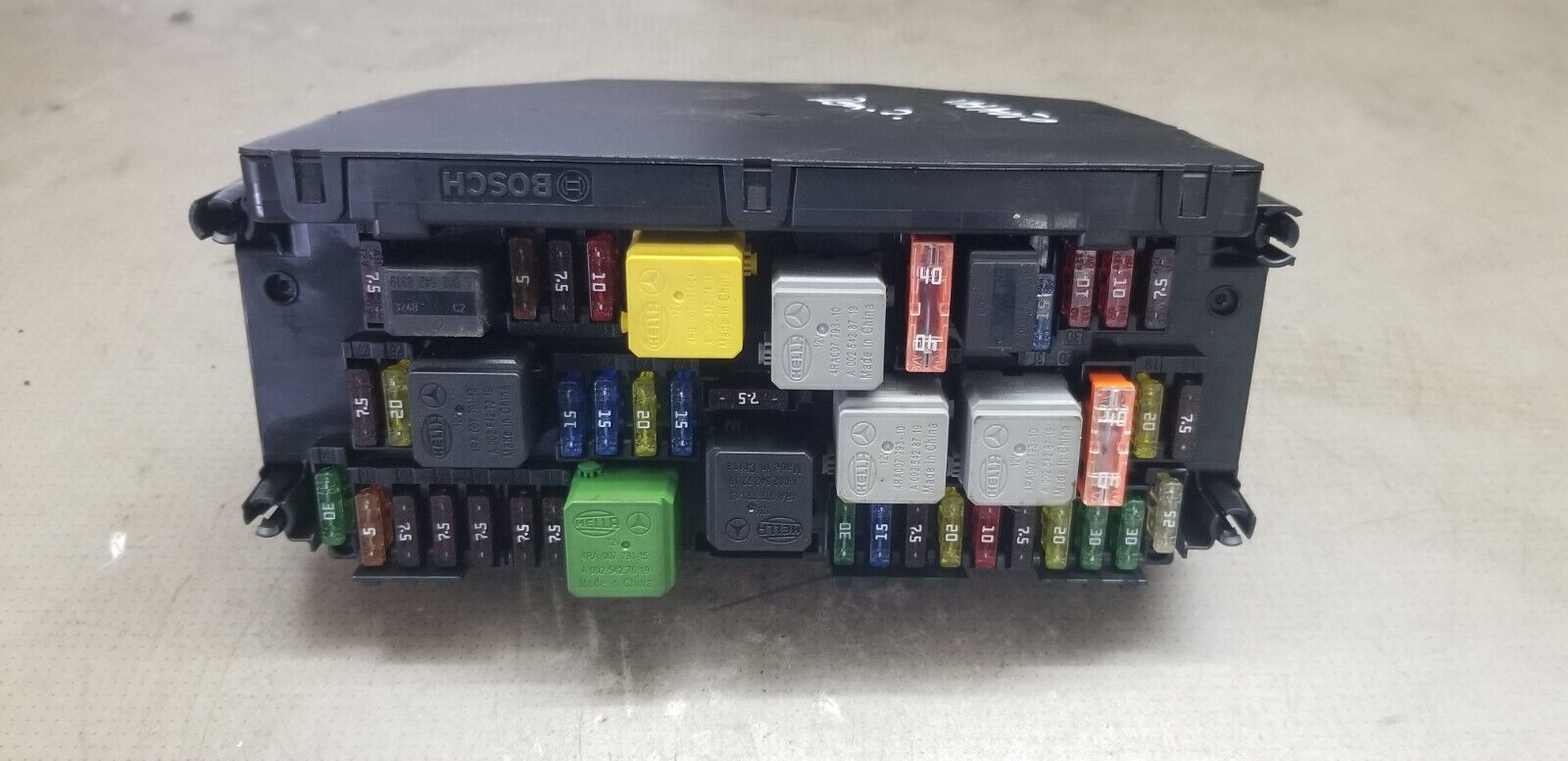 Close-up of Mercedes-Benz E300 AMG Sport Hybrid fuse box ECU A2129006924