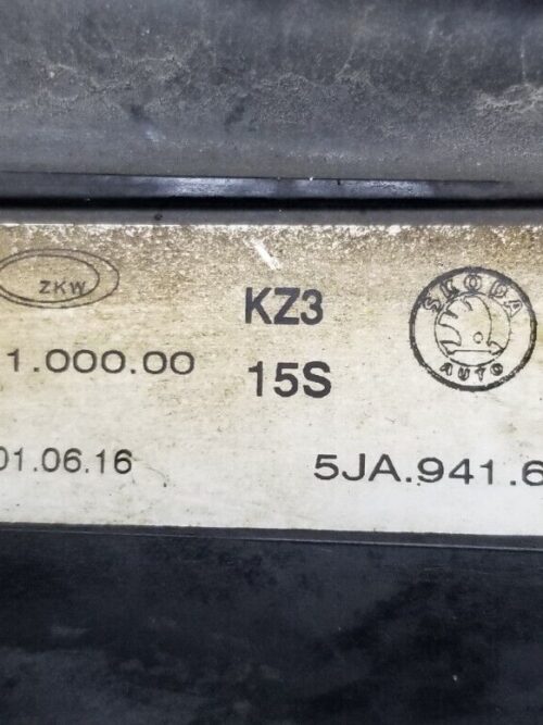 Close-up of OEM fog light 5JA941699 for Skoda Rapid 2012–2017