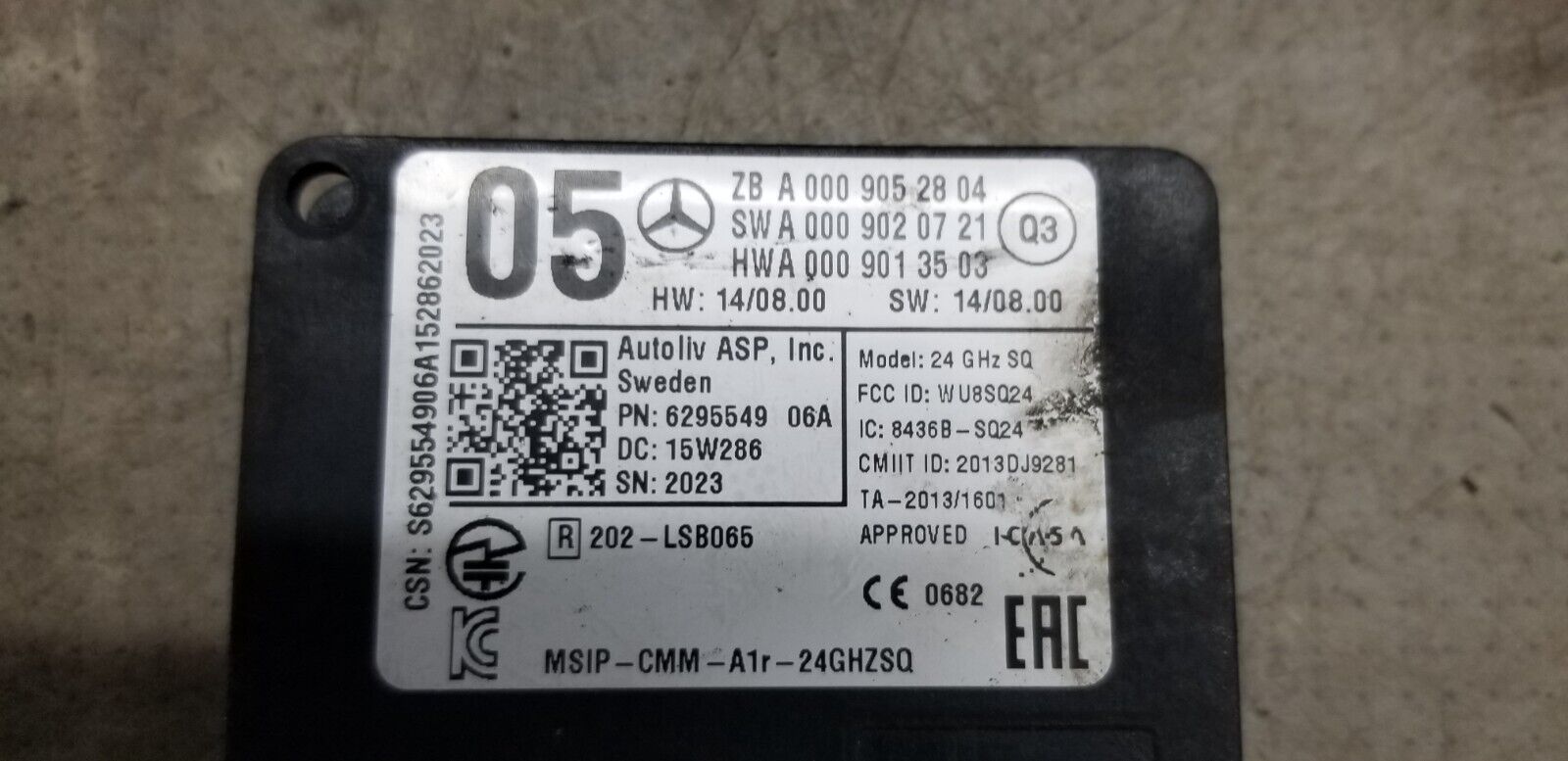 Close-up of Mercedes-Benz Distronic radar sensor A0009052804