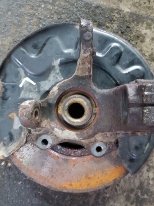 Rear view of Skoda Rapid front left wheel hub knuckle showing mounting points